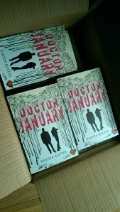 A box of author copies of Doctor January in paperback.