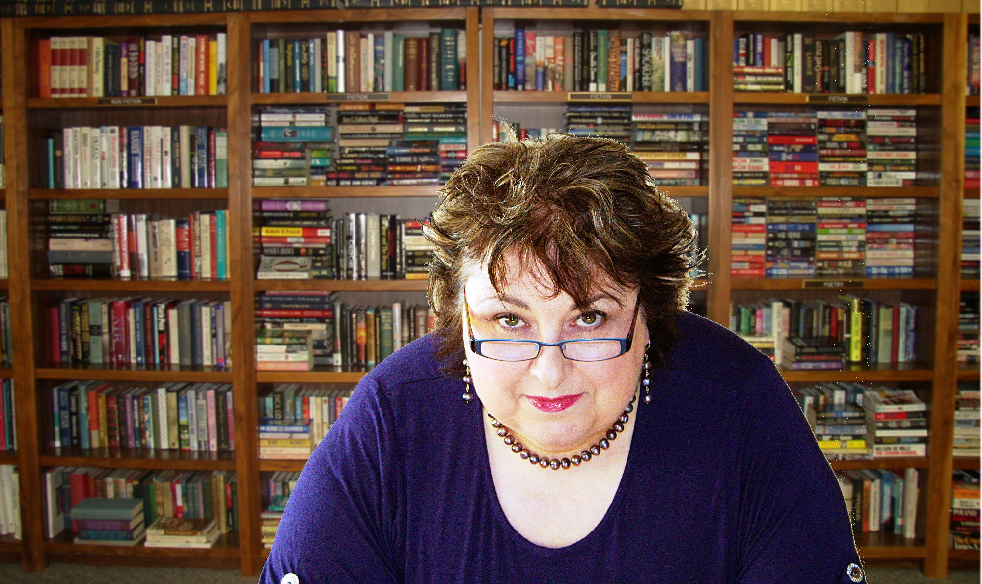 avril-portrait_0004-with-books-2-copy