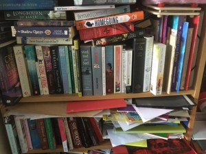 Picture of Jenni's messy bookshelves